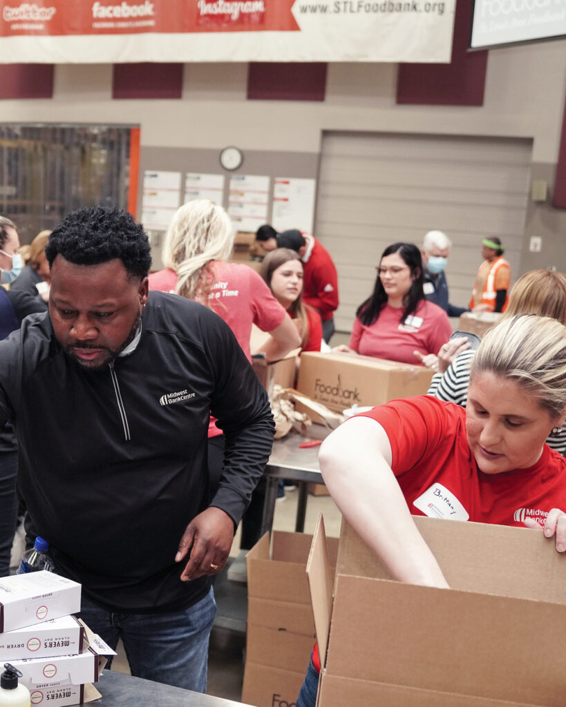 Midwest BankCentre employees volunteering at St. Louis Area Foodbank